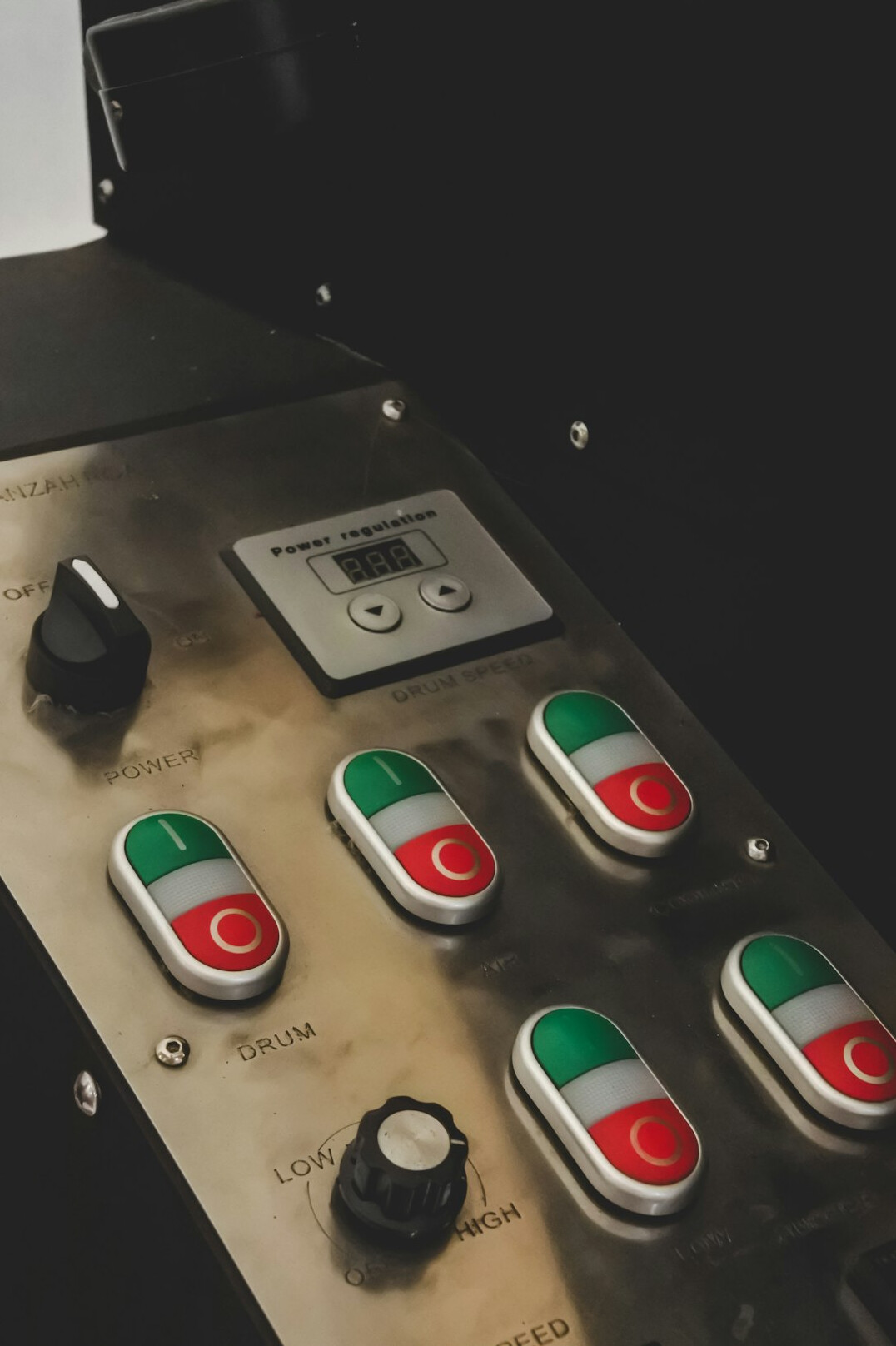 Close-up of a live production switcher with illuminated buttons